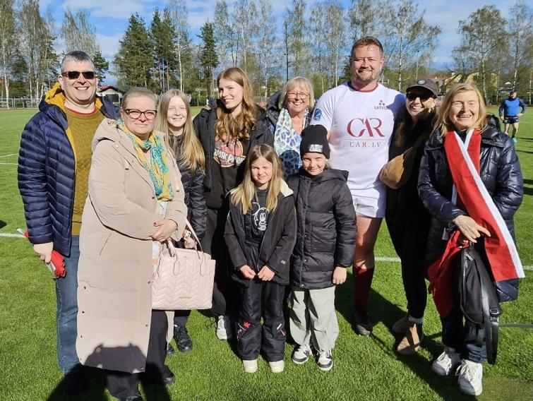  Tom and mum Debbie with some of his Latvian family
